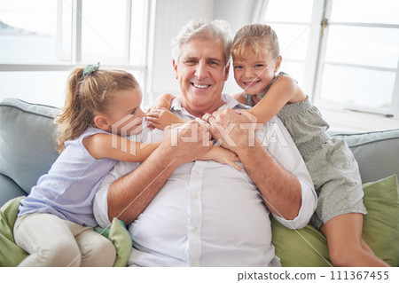 Happy family hug, love and grandfather with children, youth or grandkids playing together, bonding and have fun. Happiness and portrait of senior grandparent with kids relax on home living room sofa Happy family hug, love and grandfather with children, youth or grandkids playing together, bonding and have fun. Happiness and portrait of senior grandparent with kids relax on home living room sofa 111367455