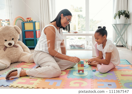 Teaching game, building toys and mother with girl in kid bedroom for growth, knowledge and problem solving. Mom, child or black people together on a floor for mental thinking development and learning 111367547