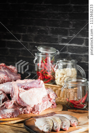 raw beef steak on a black background 111368233