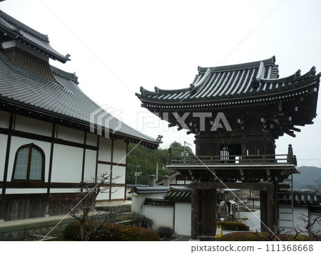 Sanmon gate and plum tree in Sesshu Garden 111368668
