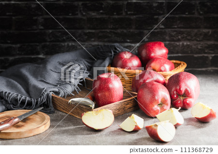 red apples on wooden background 111368729