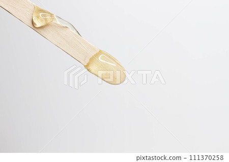 Spatula and sugar paste.Shugaring with sugar. Waxing. 111370258