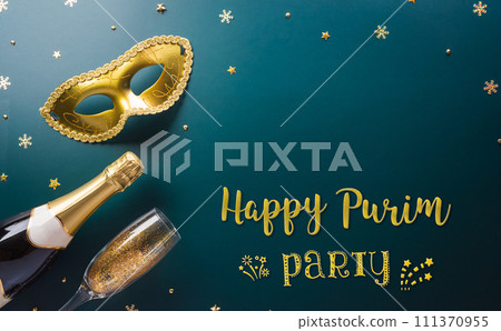 Happy Purim carnival decoration concept made from golden mask star and glitter on dark background. (Happy Purim in Hebrew, jewish holiday celebrate) Happy Purim carnival decoration concept made from golden mask star and glitter on dark background. (Happy Purim in Hebrew, jewish holiday celebrate) 111370955