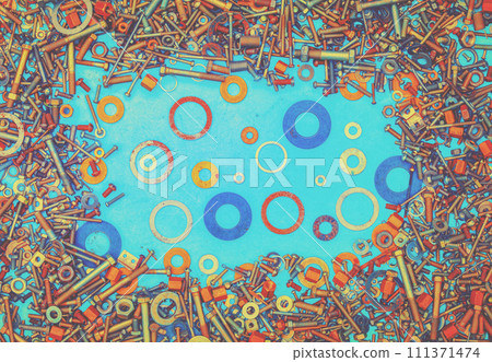 Abstract grunge colorful metallic background from bolts, screws, nuts 111371474