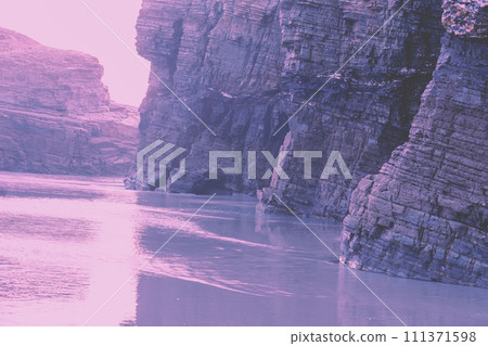 Seascape in the morning. Rocky sea coast at sunrise. Beach Playa de Las Catedrales in Ribadeo, Galicia, Spain, Europe 111371598