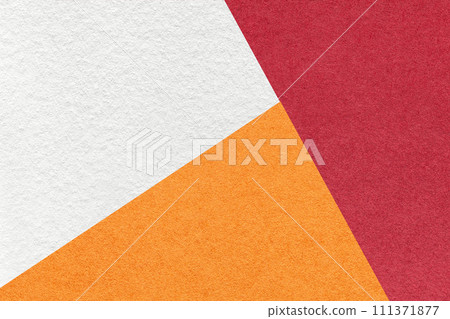 Texture of craft red, white and orange shade color paper background, macro. Vintage abstract cardboard Texture of craft red, white and orange shade color paper background, macro. Vintage abstract cardboard 111371877