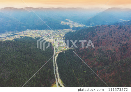 Top view of the mountain landscape in autumn. Tatariv village in the valley. The Carpathians. Ukraine 111373272