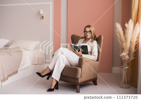 Professional Woman Engaging in Quiet Study Professional Woman Engaging in Quiet Study 111373720