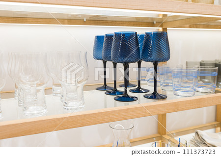 Elegant Blue Stemware and Clear Glasses Elegant Blue Stemware and Clear Glasses 111373723