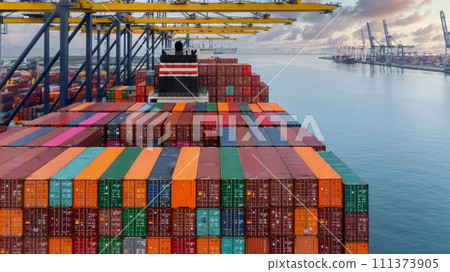 Aerial view container cargo ship maritime carrying container, Global business import export logistic freight shipping transportation international by container cargo ship, Container fright shipping. Aerial view container cargo ship maritime carrying container, Global business import export logistic freight shipping transportation international by container cargo ship, Container fright shipping. 111373905