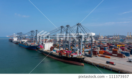 Aerial view container cargo ship maritime carrying container, Global business import export logistic freight shipping transportation international by container cargo ship, Container fright shipping. Aerial view container cargo ship maritime carrying container, Global business import export logistic freight shipping transportation international by container cargo ship, Container fright shipping. 111373937