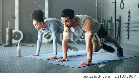 Couple, fitness and gym workout of training friends together for a core strength exercise for abs. Strong, sports and athlete wellness cardio of people doing a sport in a health club or studio 111373997