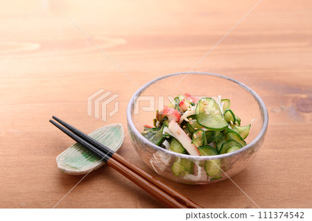 Pickled cucumber served in a small bowl Pickled cucumber served in a small bowl 111374542