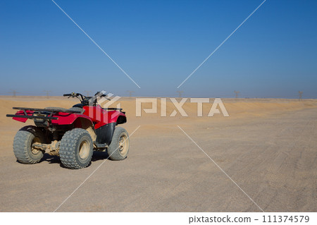 Quad bike in the Arabian desert 111374579