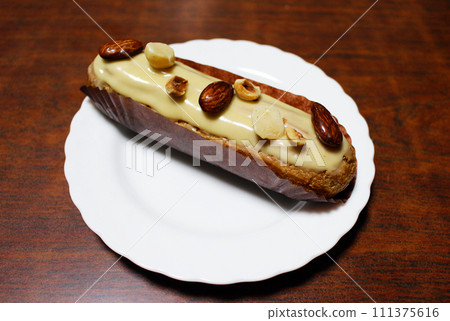 Eclair (caramel flavor) 111375616