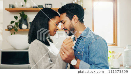 Couple, dancing and kitchen with love for bonding and quality time in home. Romance, marriage and man or woman with movement for care with calm to celebrate happy relationship for partnership. 111375899