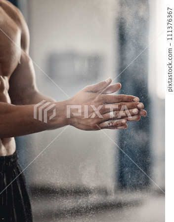 Strong man, powder hands and dust for exercise challenge, gym club workout and fitness training. Zoom of healthy bodybuilder, clapping chalk grip and sports athlete motivation for performance power 111376367