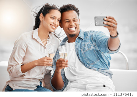 Couple selfie, luxury boat cruise and champagne wine glass celebration for anniversary, honeymoon and love in Miami Florida. Happy man, smile woman and yacht party photos, travel and summer sea relax Couple selfie, luxury boat cruise and champagne wine glass celebration for anniversary, honeymoon and love in Miami Florida. Happy man, smile woman and yacht party photos, travel and summer sea relax 111376413