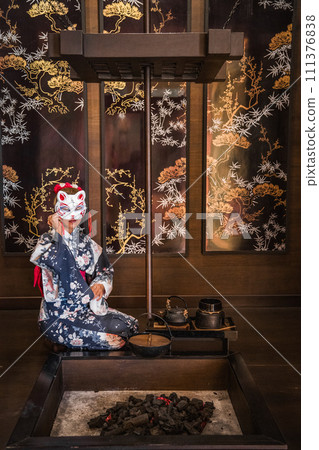 Asian girl in kimono and umbrella in Japanese theme park Hinoki Land in Chai Prakan District, Chiang 111376838