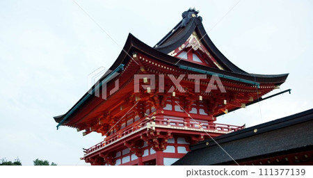Architecture, building and shinto temple for religion, travel and traditional landmark for spirituality. Buddhism, Japanese culture and trip to Kyoto, zen and pray in landscape by sky background 111377139