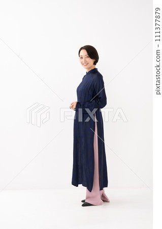 Woman wearing Ao Dai, whole body 111377879