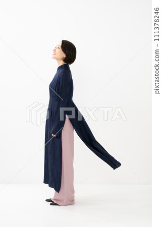 Woman wearing Ao Dai, profile 111378246