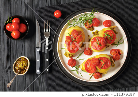 Pesto Tomato Cheese Chicken Breast, top view 111379197