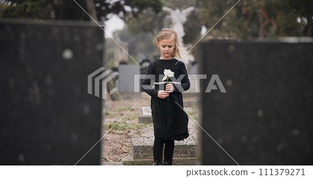 Sad, death or kid in cemetery for funeral. spiritual service or grave visit for respect in Christian religion. Mourning, tomb or depressed girl child outside in graveyard for grief, loss or farewell Sad, death or kid in cemetery for funeral. spiritual service or grave visit for respect in Christian religion. Mourning, tomb or depressed girl child outside in graveyard for grief, loss or farewell 111379271