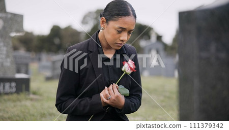 Sad woman, rose and graveyard in loss, grief or mourning at funeral, tombstone or cemetery. Female person with flower in depression, death or goodbye at memorial or burial service for loved one Sad woman, rose and graveyard in loss, grief or mourning at funeral, tombstone or cemetery. Female person with flower in depression, death or goodbye at memorial or burial service for loved one 111379342