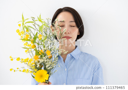 A woman with flowers 111379465