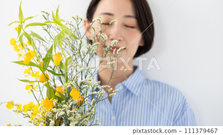 A woman with flowers 111379467