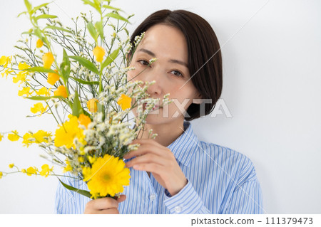 A woman with flowers A woman with flowers 111379473