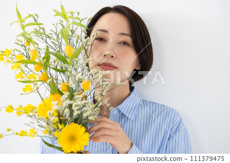 A woman with flowers A woman with flowers 111379475