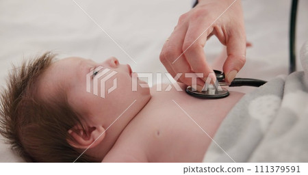 Baby, stethoscope and doctor listening to heart, breathing and test kids healthcare in clinic. Infant, heartbeat and hand of pediatrician examine patient, chest and check cardiology health of lungs Baby, stethoscope and doctor listening to heart, breathing and test kids healthcare in clinic. Infant, heartbeat and hand of pediatrician examine patient, chest and check cardiology health of lungs 111379591