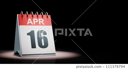 April 16 Calendar Spotlighted on Black Background 111379794
