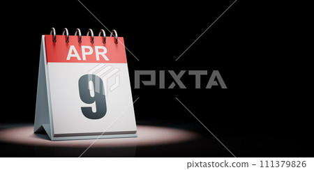 April 9 Calendar Spotlighted on Black Background 111379826
