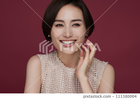 Color background makeup image of a young woman 111380004