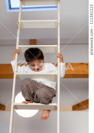 Toddler 3 year old playing indoors 111381223