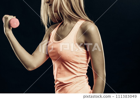 Fitness sporty girl lifting weights 111383049