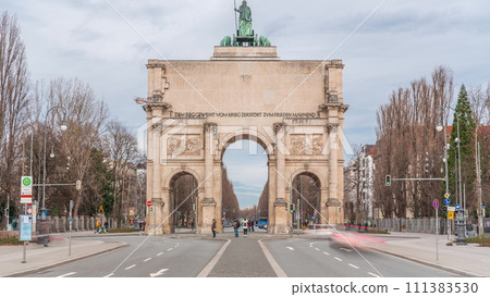 The Siegestor or Victory Gate in Munich is a memorial arch, crowned with a statue of Bavaria with a lion quadriga timelapse. Germany The Siegestor or Victory Gate in Munich is a memorial arch, crowned with a statue of Bavaria with a lion quadriga timelapse. Germany 111383530