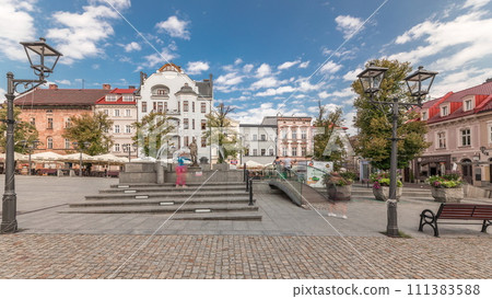 Panorama showing Neptune fountain on Old Town Market Square timelapse with historical houses around. Panorama showing Neptune fountain on Old Town Market Square timelapse with historical houses around. 111383588