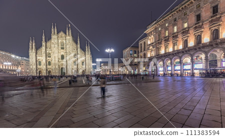 Panorama showing Milan Cathedral and Vittorio Emanuele gallery day to night timelapse. Panorama showing Milan Cathedral and Vittorio Emanuele gallery day to night timelapse. 111383594