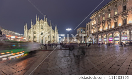 Panorama showing Milan Cathedral and Vittorio Emanuele gallery day to night timelapse. 111383595