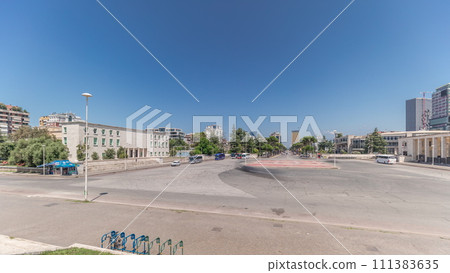Panorama showing traffic on the Deshmoret e Kombit Boulevard in Tirana timelapse. Panorama showing traffic on the Deshmoret e Kombit Boulevard in Tirana timelapse. 111383635