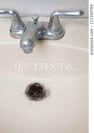 Blocked drain hole in sink Blocked drain hole in sink 111384769