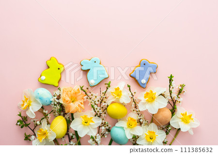 Spring flowers and Easter eggs and bunnies 111385632