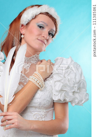 Beautiful ginger in a dress of Snow Queen 111385861