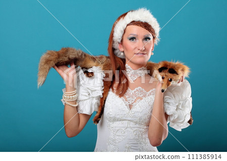 Beautiful ginger in a dress of Snow Queen 111385914