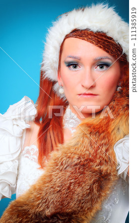 Beautiful ginger in a dress of Snow Queen Beautiful ginger in a dress of Snow Queen 111385919