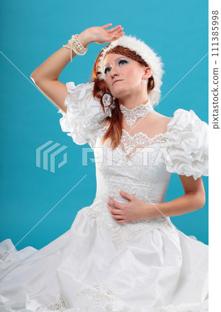Beautiful ginger in a dress of Snow Queen Beautiful ginger in a dress of Snow Queen 111385998